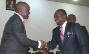 SWEARING-IN: Governor Emmanuel Uduaghan of Delta State (left) congratulating the new Delta State Head of Service, Mr. Paul Evuareherhe shortly after taking oath of office as Head of Delta State Civil Service held at the Unity Hall, Government House, Asaba.  Photo: Henry Unini 