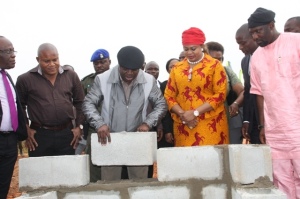 Governor Emmanuel Uduaghan of Delta State (middle), flanked by Mrs Stella Oduah (2nd right), Minister of Aviation; Rt Hon Funkekeme Solomon (2nd left) and Mr Oche Victor Elias (right) S.A to the Aviation Minister, laying foundation stone of the Cargo Terminal of the Asaba International Airport in Asaba. Pix: Bripin Enarusai