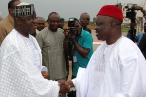 FUNERAL: Governor Emmanuel Uduaghan of Delta State (right) welcoming the Senate President, Senator David Mark (left) on arrival at the Asaba International Airport for the funeral service of Obi-Bridget Okpuno, mother of the Chairman of ULO Construction, Chief Uche Okpuno in Asaba, Friday