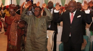 2014 DEMOCRACY DAY CELEBRATION: from right; Governor Emmanuel Uduaghan of Delta State, his Deputy, Prof. Amos Utuama and his wife Nelly Utuama praying for the Nation at the Inter Denominational Service marking the 2014 Democracy Day celebration held at the Event Centre, Asaba, Thursday