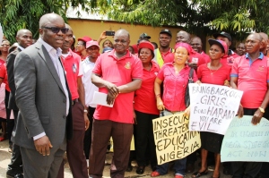 PROTEST: Governor Emmanuel Uduaghan of Delta State (left) addressing members of the Nigeria Union of Teachers, Delta State chapter protesters calling for release of Chibok Girls in Asaba, Thursday. Photo: Henry Unini 