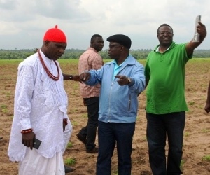 Governor Emmanuel Uduaghan of Delta State(Middle) and H.R.M. AVM. Lucky Ochuko Ararile (RTD) the Ovie of Umiaghwa Abraka(Left) and Dr. Fregene Martins, representing Minister for Agriculture during an inspection visit to the Cassava Farm, one of the Cassava Integration Project of the Federal Government