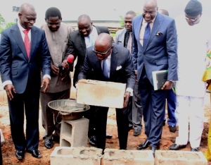 Governor Emmanuel Uduaghan of Delta State (middle) Laying the foundation of the Delta NUJ Secretariat complex in Asaba during the 2014 Delta NUJ Press Week