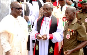 THANKSGIVING: from left; Governor Emmanuel Uduaghan of Delta State, The Bishop of the Diocese of Asaba, Rt. Revd. Justus Mogekwu and the Chairman of the Nigeria Legion, Delta State chapter, Lt. Col. Daniel Amereh during the Inter-Denominational thanksgiving service marking the year 2015 Armed Forces Remembrance Day celebration held at the Anglican Cathedral Church of St. Peter’s, Asaba 