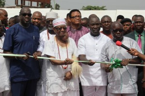 COMMISSIONING: from right; Governor Emmanuel Uduaghan of Delta State, Chairman, Oshimili South LGA, Barr. Chucks Obusom, The representative of Asagba of Asaba, Chief Goodluck Onyeobi and Commissioner for Information, Barr. Chike Ogeah during the official commissioning of 64 township roads in Asaba by the governor yesterday. Photo: Henry Unini 