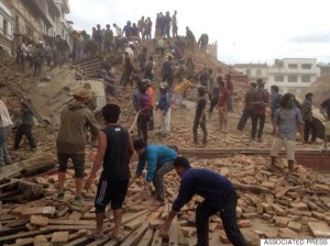 lVolunteers help with rescue work at the site of a building that collapsed after an earthquake in Kathmandu, Nepal, Saturday, April 25, 2015.