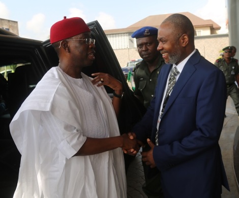 Delta State Governor Senator Ifeanyi Okowa (left) and Executive Director PIND Foundation, Mr. Sam Daibo, during his arrival at the Niger Delta Development Forum 2015, in Asaba.