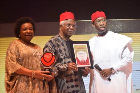 Delta State Governor, Senator Dr Ifeanyi Arthur Okowa, presenting the Vanguard Newspapers Lifetime Achievement Awards 2015 to Dr Alex Ekwueme, the first elected Vice President of Nigeria as his wife, Mrs Beatrice Ekwueme watches with admiration at EKO Hotel & Suites, V/I, Lagos on Friday night.