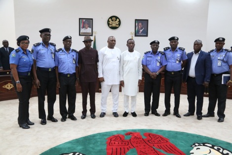 Delta State Governor, Senator Ifeanyi Okowa (5th right); his Deputy, Barri . Kingsley Otuaro (5th left), in a group photograph with the new CP . Mr. Zanna Ibrahim during a courtesy call by the latter on the Governor in Asaba