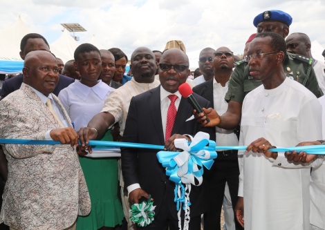 Delta State Governor, Senator Ifeanyi Okowa (right); the Immediate Past Governor, Dr. Emmanuel Uduaghan (middle); Speaker, State House of Assembly, Rt. Hon. Monday Igbuya (left) and Other Dignitaries, during the Commissioning of Ogbemudein Model Secondary School Agbor, Ika-South Local Government Area, Delta State.