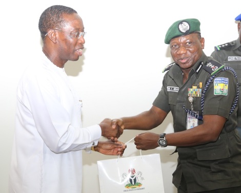 Delta State Governor, Senator Ifeanyi Okowa (left) and the Ag Inspector General of Police, Alhaji Ibrahim Idris during a courtesy call by the Ag IG on Governor Ifeanyi Okowa in  Asaba..  